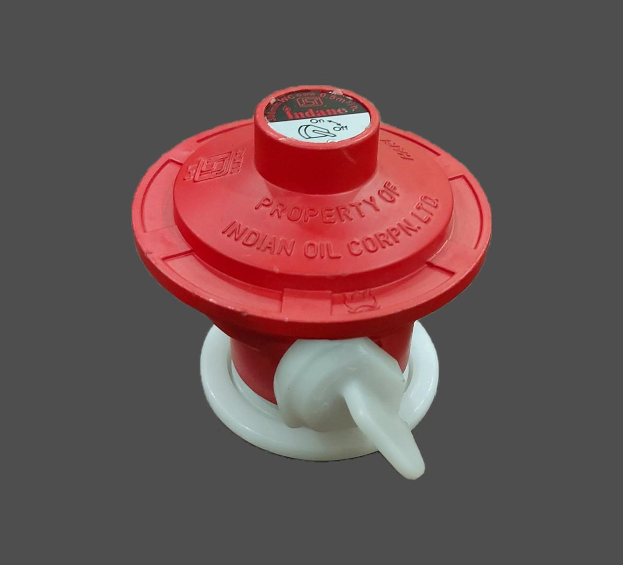 Red LPG regulator with printed brand label and molded markings